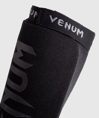 Espinilleras con protector de pies a media Venum Kontact