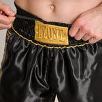 Pantalones cortos kick-tailandés Leone DNA Premium AB969 Negro 