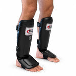 Espinilleras Fairtex SP3 de doble acolchado con protector de pies