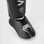 Espinilleras Venum Challenger Negro-plata 