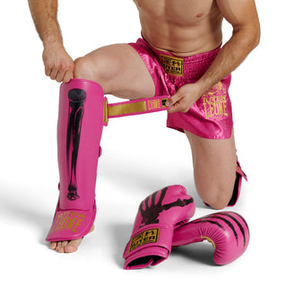 Espinilleras Leone Iuter PT01IU con parapiés Fucsia 
