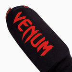 Espinilleras con protector de pies a media Venum Kontact 