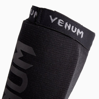 Espinilleras con protector de pies a media Venum Kontact 