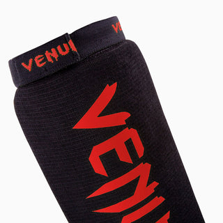 Espinilleras con protector de pies a media Venum Kontact 